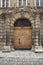 Vienna, Austria - 15 April 2018: ancient wooden doors. main entrance with family coat of arms.