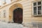 Vienna, Austria - 15 April 2018: ancient wooden doors. main entrance with family coat of arms.