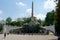 VIENNA, AUSTRIA - APR 30th, 2017: View of Obelisk Fountain Obeliskbrunnen in the public park of Schonbrunn Palace