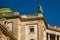 Vienna, Austria: Hofburg palace and panoramic square view, people walking and fiaker with white horses in Vienna, Austria