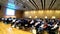 Vienna, Austria - July 18, 2019 People attending and listning to an European scientific conference talk in time lapse