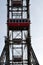 VIENNA, AUSTRIA - MARCH 18, 2016: The red cabin of oldest Ferris Wheel in Prater park on sky background Vienna Prater Wurstelprat
