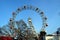 VIENNA, AUSTRIA - MARCH 18, 2016: The red cabin of oldest Ferris Wheel in Prater park on sky background Vienna Prater Wurstelprat