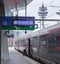 VIENNA, AUSTRIA - MAY 27: The steward of train to Vienna - Innsbruck - Zurich before departure. The platform of main railway