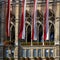 Vienna City Hall facade view with austrian flags, beautiful windows