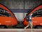 Vienna - June 1 2019: A tourist walkin in front of the connection of two trains cars