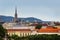 Vienna, panorama view of town and mountains in background.