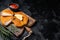 Viennese veal escalope, fried meat Schnitzel steak. Black background. Top view. Copy space