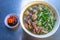 Vietnam flavored Pho bowl- beef meat noodles and vegetables