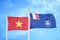 Vietnam and French Southern and Antarctic Lands two flags on flagpoles