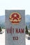 Vietnam milestone sign on the 113 national highway