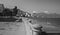 Vietnam. The sea embankment in Nha Trang. Sea and mountains. Black and white.