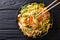 Vietnamese chicken salad with rice noodles, carrots and herbs ma