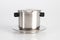 Vietnamese coffee press on white background. Metallic coffee filter cup. Brewing coffee in Vietnam. Stainless Steel Single-Cup