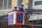 Vietnamese electrical networks. Electrical wires on poles in Ho Chi Minh. A technician is repairing or checking the messy