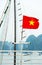 Vietnamese flag on ship deck, Halong, Vietnam. Vertical.