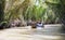 Vietnamese with long boats waiting for tourist to give them a ride on Mekong rive, Vietnam