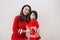 Vietnamese mother and daughter celebrate new year at home. Tet H