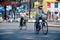 Vietnamese people riding bicycle on the road