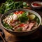 Vietnamese Pho soup with beef, rice noodles and herbs