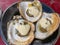 Vietnamese styled grilled oysters topped with creamy cheese sauce