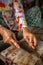 Vietnamese woman slices eels