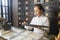 Vietnamese woman working at traditional apothecary