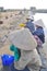 Vietnamese women salt workers are relaxing after working hard to collect salt from the extract fields to the storage fields