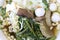 Vietnamse noodle soup, served with fresh herbs at the buddhist eatery, radish, morning glory, shiitake and tofu in white bowl on W