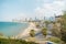 Viev on the beach and urban city Tel-Aviv. Summer coastline. Famous tourist place