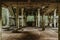 View of abandoned empty buildings of old tin mine. Industrial dirty building interior. Damaged factory in Rolava, Ore mountains,