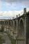 View of the abandoned old Mokrinsky railway bridge. Russia, the bridge was built in 1918, the man on the bridge