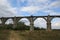 View of the abandoned old Mokrinsky railway bridge. Russia, the village of Mokry, the bridge was built in 1918