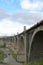 View of the abandoned old Mokrinsky railway bridge. Russia, the village of Mokry, the bridge was built in 1918