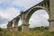 View of the abandoned old Mokrinsky railway bridge. Russia, the village of Mokry, the bridge was built in 1918