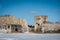 View of abandoned prison located in small lake with blue clear water in Rummu, Estonia.