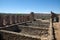 View from the abandoned shearing shed pens across to the arid hills