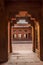 A view of the abandoned temple at Fathepur Sikri, India seen through a doorway