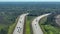 View from above of american wide freeway in Florida with dense traffic of driving cars during rush hour. USA