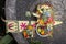 View from above of Balinese offerings on stone surface