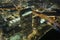 View from above of brightly illuminated high skyscraper buildings in downtown district of Tampa city in Florida, USA