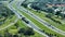 View from above of busy american highway with fast moving trucks and cars. Interstate transportation concept