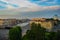 View from above the city in the evening: the roof, the Fontanka river, the bridge, the blue dome of Trinity Cathedral