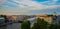 View from above the city in the evening: the roof, the Fontanka river, the bridge, the blue dome of Trinity Cathedral