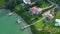 View from above of large residential homes in southwest Florida. American waterfront houses in rural US suburbs