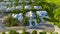 View from above of large residential houses in closed living golf club in south Florida. American dream homes as example