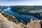 View from above Preikestolen/Pulpit Rock, tourists and lysefjorden.