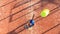 View from above of a professional padel player who is going to hit the ball