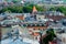 view from above on a sunny day in the roofs of houses in a European city