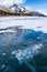 View of Abraham lake in Alberta with methane gas bubbles formed in the ice.